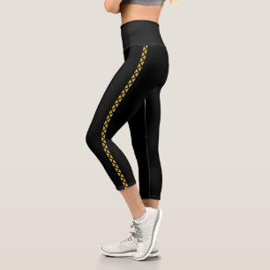Schwarze Capri-Leggings mit auffälligem goldenen S Capri Leggings
