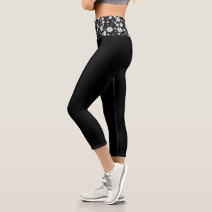 Schwarze Caprihose mit weißen Gänseblümchenmuster  Capri Leggings