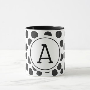 Schwarze Flecken in Wasserfarbe mit Monogramm Tasse