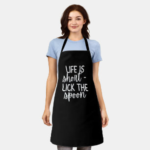 Schwarze Frauen-Schürze „Life Is Short – Lick the  Schürze