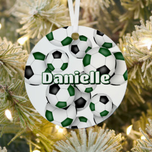 Schwarze Fußball-Bälle in gebündeltem Grün Ornament Aus Metall