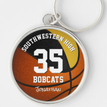 Schwarze goldene Jungs Sportteam heißt Basketball