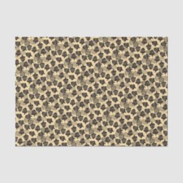 Schwarze Holzkörner auf Creme Seidenpapier