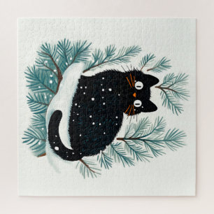 Schwarze Katze auf dem Weihnachtsbaum niedlich