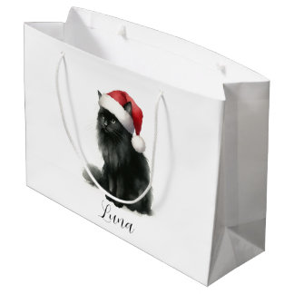 Schwarze Katze auf festlichem Weihnachtsmannmütze  Große Geschenktüte