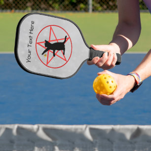 Schwarze Katze baumelnder goldener Stern rotes Pen Pickleball Schläger