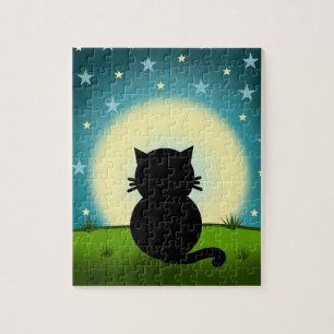 Schwarze Katze betrachtet den Mond