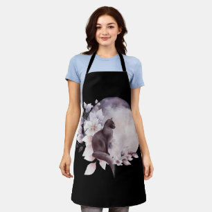 Schwarze Katze durch einen magischen Vollmond Schürze
