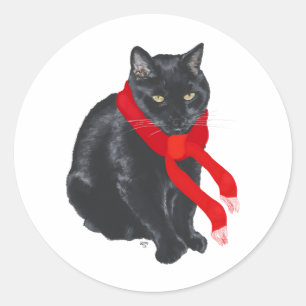 Schwarze Katze hält sich an Weihnachten warm Runder Aufkleber