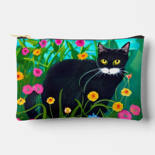 Schwarze Katze im farbenfrohen Blumengarten Zubehörtasche