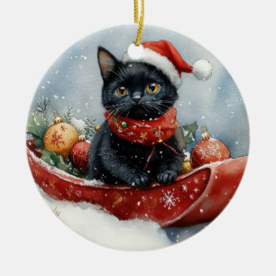 Schwarze Katze im Schlitten Lass es schneien Weihn Keramik Ornament
