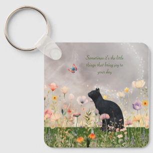 Schwarze Katze in Blume Schlüsselanhänger