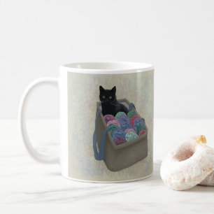 Schwarze Katze in Garntüte Kaffeetasse