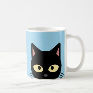 SCHWARZE KATZE LUGT AUS ROSAFARBENE KAFFEETASSE