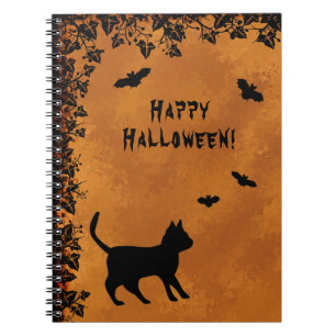 Schwarze Katze mit Bat, glückliches Halloween Notizblock