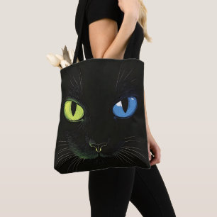 Schwarze Katze mit grünen und blauen Augen Tasche