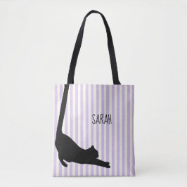 Schwarze Katze mit langen Schwänzen über die Tasch Tasche