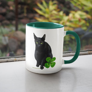 Schwarze Katze mit Vierblättriges Kleeblatt Tasse