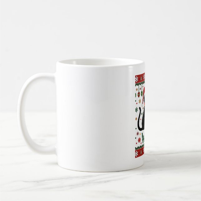 Schwarze Katze schiebt Weihnachtsbaum lustige Katz Kaffeetasse (Links)