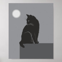 schwarze Katze sitzt auf dem Tisch