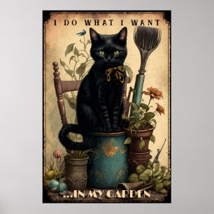 Schwarze Katze sitzt im Garten Poster
