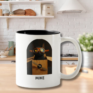 Schwarze Katze sitzt in einer Kiste Flugzeug Perso Zweifarbige Tasse