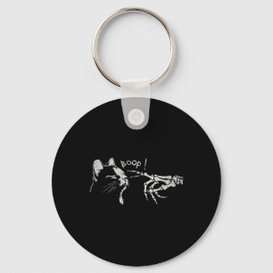 Schwarze Katze Skeleton Hand Boop auf der Nase ein Schlüsselanhänger