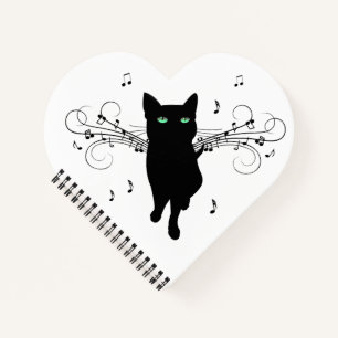 Schwarze Katze umgeben von flüsternden Noten der M Notizbuch