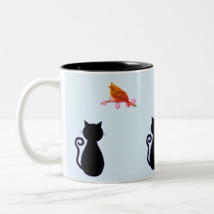 Schwarze Katze und roter Vogel Zweifarbige Tasse
