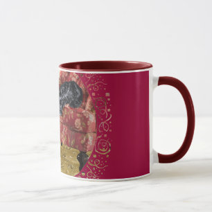 Schwarze Katze und Schottischer Terrier in einem r Tasse