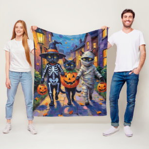 Schwarze Katzen beim Trick-or-Treat in Halloween-K Fleecedecke