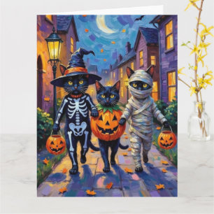 Schwarze Katzen beim Trick-or-Treat in Halloween-K Karte