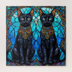 Schwarze Katzen in künstlerisch festgehaltenem Gla