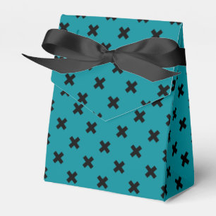 Schwarze Kreuzstiche auf aquamarinen Geschenkschachtel
