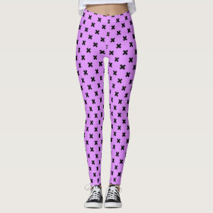 Schwarze Kreuzstiche auf Lila Leggings
