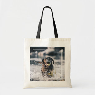 Schwarze Labrador-Plays in Wasser Tragetasche