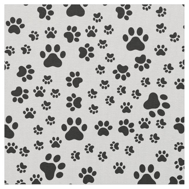 Schwarze Paw-Prints auf hellgrauem Stoff (Nahaufnahme)