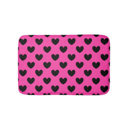 Schwarze Polka Herzen auf Fuchsienrosa Badematte