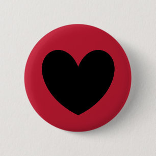 Schwarze Polka Herzen auf rot Button