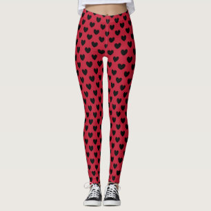 Schwarze Polka Herzen auf rot Leggings