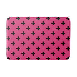 Schwarze Polka-Kreuze auf Fuchsia Badematte