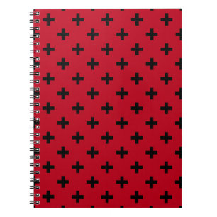 Schwarze Polka Kreuze auf rot Notizblock