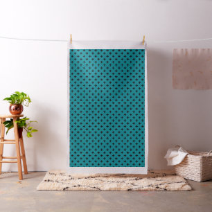 Schwarze Polka kreuzt auf aquamarin Stoff