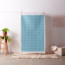 Schwarze Polka kreuzt in Babyblau Stoff