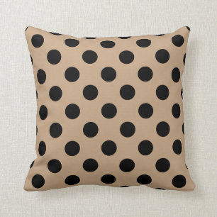 Schwarze Polka-Punkte auf Beige Kissen