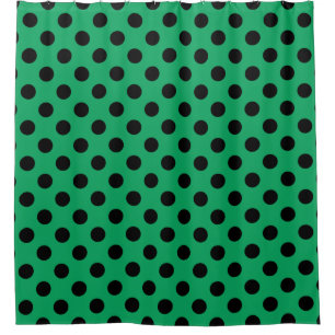 Schwarze Polka Punkte auf frisch grünem Duschvorhang