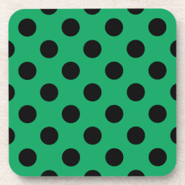 Schwarze Polka Punkte auf frisch grünem Getränkeuntersetzer