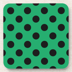 Schwarze Polka Punkte auf frisch grünem Getränkeuntersetzer