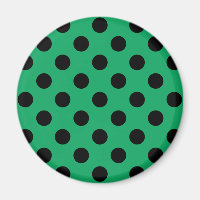 Schwarze Polka Punkte auf frisch grünem