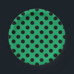 Schwarze Polka Punkte auf frisch grünem Pappteller<br><div class="desc">Schwarze Polka Punkte auf frisch grünem</div>